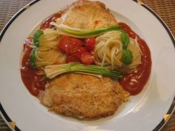 Rezept: Kleine Schweineschnitzel in Käse-Eihülle an Spaghetti mit Tomatensauce Bild Nr. 3 Kleine Schweineschnitzel in Käse-Eihülle an Spaghetti mit Tomatensauce - Rezept - Bild Nr. 3