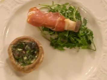 Kräutersaitlinge mit Schinken an gefüllten Champignons mit - Rezept