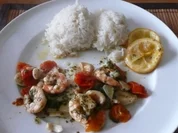 Schollenfilets und Riesengarnelen treffen Zitrone,Knoblauch,Kraeuter,Cashewkerne und Tomaten - Rezept
