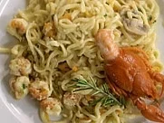 Tagliolini mit Flußkrebsfleisch in Curry Chilly Soße - Rezept