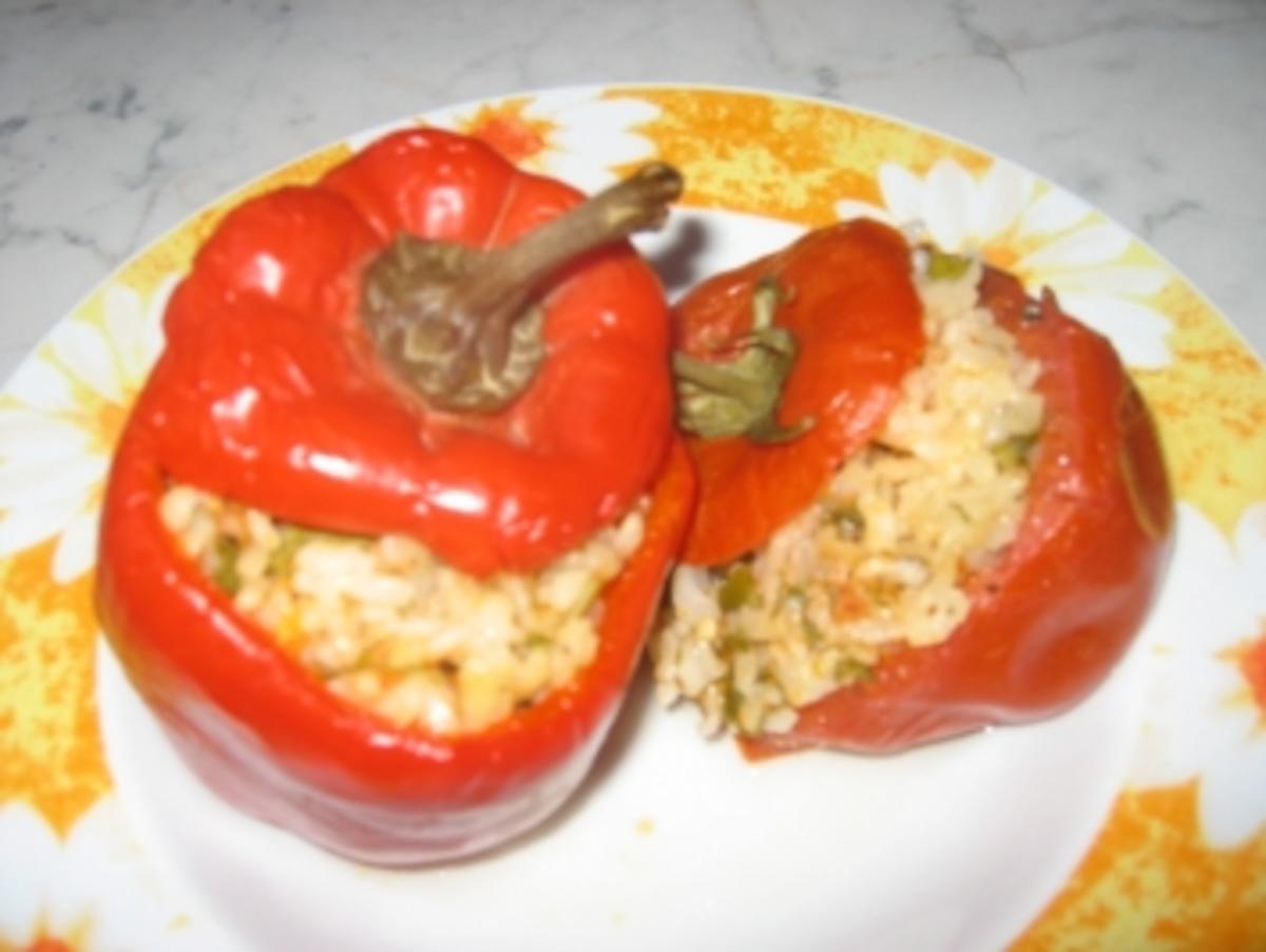 Gefüllte Tomaten und Paprika - Rezept mit Bild - kochbar.de