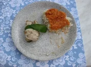 Pangasiusfiletröllchen mit Tomatensauce und Bärlauch - Rezept