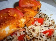 Seelachsfilet auf Reis-Tomaten-Salat - Rezept