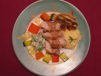 Spanferkelrücken mit Ochsenschwanzsoße und Knoblauch-Kartoffelpüree - Rezept