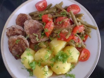 Medaillons auf Bohnen-Tomaten-Gemüse - Rezept