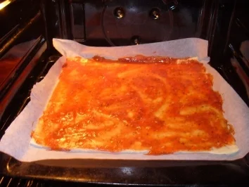 Pizza mit Rucola, Parmesan und Parmaschinken - Rezept - Bild Nr. 2