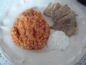 Tomatenreis zu Seelachsfilet - Rezept