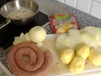 Kartoffel-Kohlrabi-Gratin mit frischer Bratwurst - Rezept - Bild Nr. 2