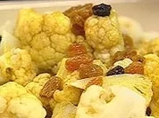 Marinierter Blumenkohl mit Curry, Rosinen und Koriander - Rezept