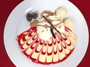 Vanille-Wolken auf verziertem Himbeer-Spiegel mit Beijinho de Coco an irischem Cremelikör - Rezept