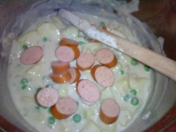 Béchamelkartoffeln mit Erbsen und Wurst - Rezept - Bild Nr. 5