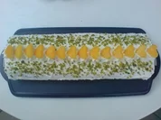 Bisquitrolle mit Pfirsichen - Rezept