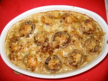 Rezept: Gefüllte Champigon grattiniert mit Rahmsauce Gefüllte Champigon grattiniert mit Rahmsauce - Rezept