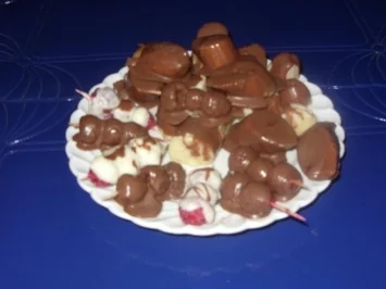 Rezept: Bananenstücke und Himbeeren im Schokokleid Bild Nr. 2 Bananenstücke und Himbeeren im Schokokleid - Rezept - Bild Nr. 2