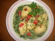 Gefüllte Katoffelklößchen in Spinatsoße - Rezept