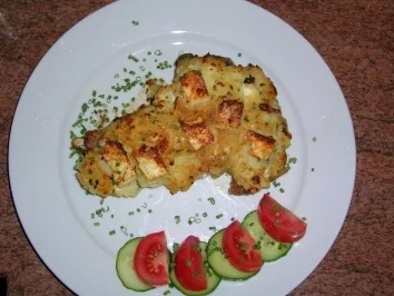 Rezept: Kalbskoteletts mit gratinierter Kartoffel-Selleriekruste Kalbskoteletts mit gratinierter Kartoffel-Selleriekruste - Rezept