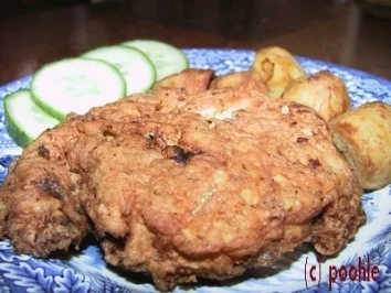 Rezept: Parmesan Schnitzel mit Bratkartoffeln Parmesan Schnitzel mit Bratkartoffeln - Rezept