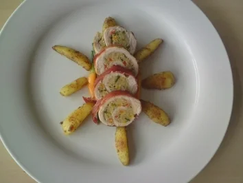 Schweineröllchen mit feiner Hackfleisch Füllung - Rezept