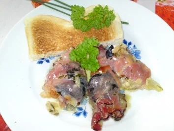 Achatschnecken mit Walnusskernen und Parmaschinken in Kräuterbutter - Rezept