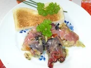 Achatschnecken mit Walnusskernen und Parmaschinken in Kräuterbutter - Rezept