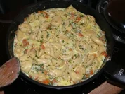 Käsetortellini mit Kräutersahne - Rezept