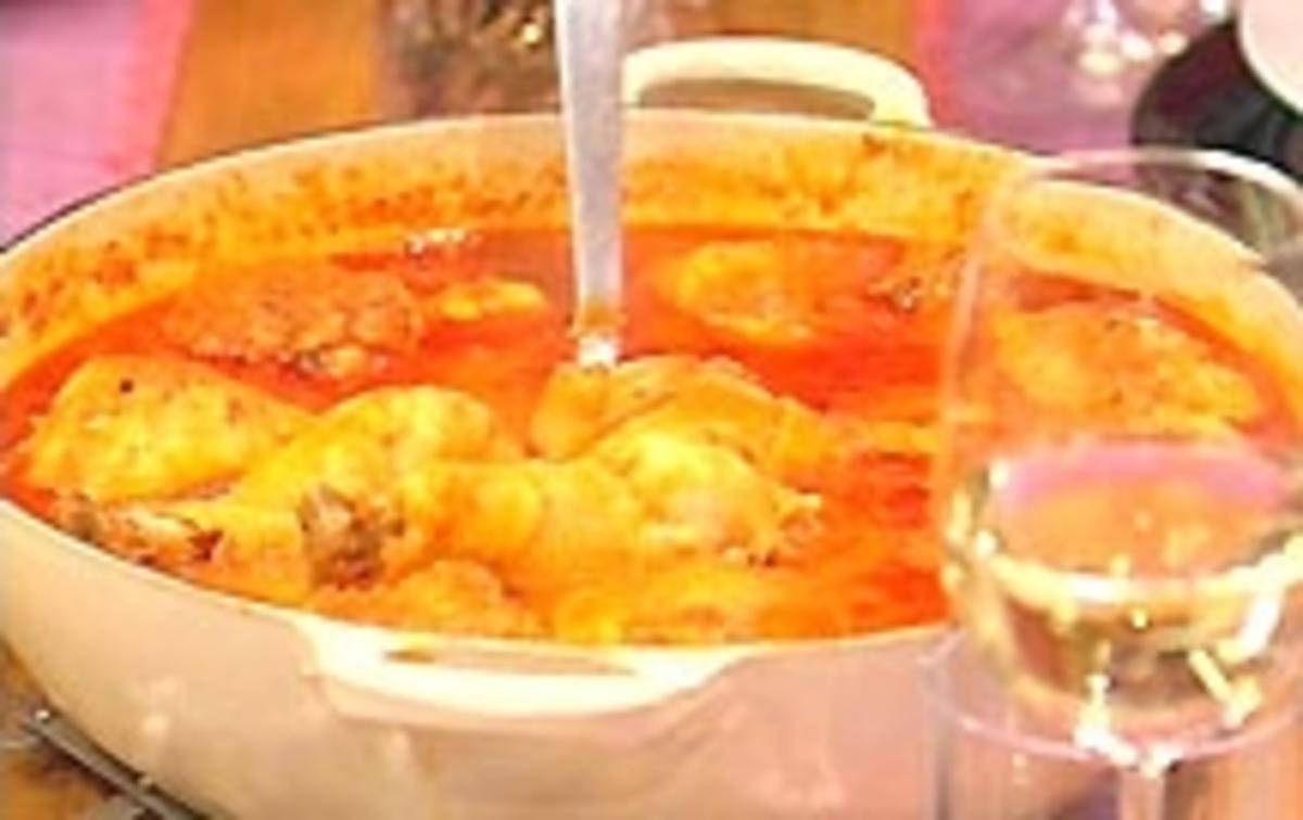 Huhn mit Tomate geschmort - Rezept