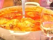 Huhn mit Tomate geschmort - Rezept