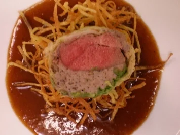 Rezept: Taube im Wirsingmantel auf Kartoffelnestern Taube im Wirsingmantel auf Kartoffelnestern - Rezept