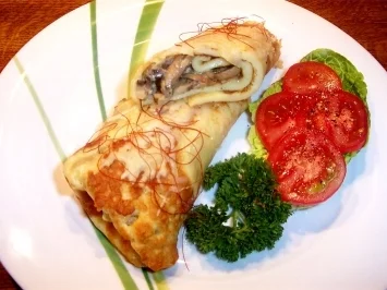 Rezept: Überbackene Pfannkuchenrollen Überbackene Pfannkuchenrollen - Rezept