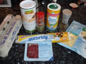 Rezept: Schlanke Blätterteigschnecken pikant gefüllt Schlanke Blätterteigschnecken pikant gefüllt - Rezept