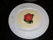 Gefüllte Tomaten mit Seezunge auf Blattspinat an Schalottencreme - Rezept