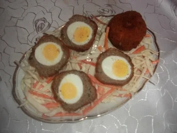 Schottische Eier auf Krautsalat - Rezept