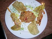 Fischteller mit dreierlei Gewürzen und leckerem mediterranem Gemüsereis - Rezept