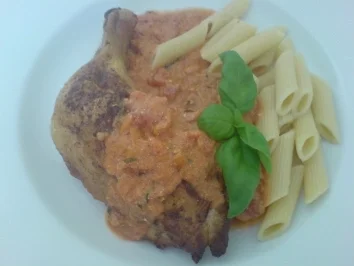 Hähnchenschenkel mit einer Rocotta-Tomaten-Basilikum-Sauce - Rezept