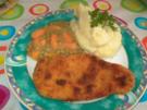 Hähnchenschnitzel mit Kartoffelpüree an Erbsen und Möhrchen - Rezept