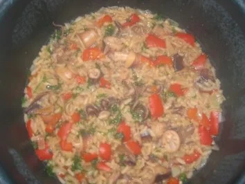 Kalmare mit Reis und Roten Paprika - Rezept