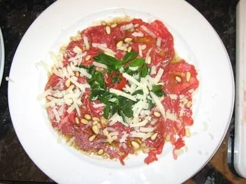 Rezept: Rindercarpaccio mit Rucola und Parmesan Rindercarpaccio mit Rucola und Parmesan - Rezept