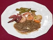 Tris di mare – Sepia, Jakobsmuscheln und Hummerkrabben auf Auberginenmousse - Rezept