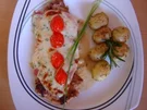SCHWEINESCHNITZEL UNTER PARMESANCREME - Rezept
