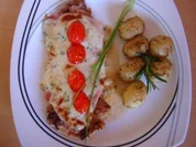 Rezept: SCHWEINESCHNITZEL UNTER PARMESANCREME SCHWEINESCHNITZEL UNTER PARMESANCREME - Rezept