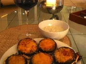 Auberginen mit Feta gefüllt, und mit Parmesan überbacken - Rezept