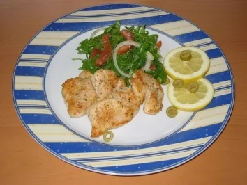 Hähnchenschnitzelchen mit Rucolasalat - Rezept
