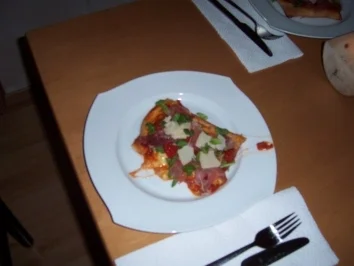 Rezept: Pizza mit Rucola und Parmaschinken Bild Nr. 3 Pizza mit Rucola und Parmaschinken - Rezept - Bild Nr. 3