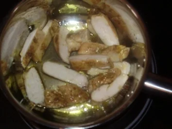 Rezept: Hühnchenfleisch mit Pilzen und Reis Bild Nr. 2 Hühnchenfleisch mit Pilzen und Reis - Rezept - Bild Nr. 2