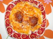 Spiegelei mit Salami und Schmelzkäse - Rezept