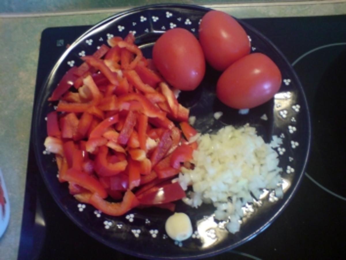 Puten-Pfanne mit Paprika-Tomaten-Sahne - Rezept - Bild Nr. 3