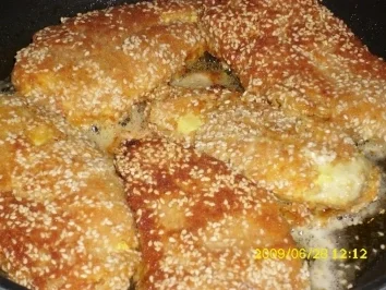 Fleisch:  Mariniertes Hähnchenbrustfilet in Sesampanade an Wokgemüse und Kokosreis - Rezept - Bild Nr. 5