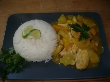 Curryhänchen mit Ananas-Mango und Limettenreis - Rezept