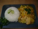 Curryhänchen mit Ananas-Mango und Limettenreis - Rezept