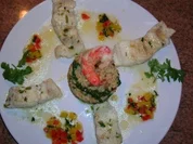 Steinbeißerfilet auf Spinatrisotto mit Pinienkernen und Paprikabutter - Rezept